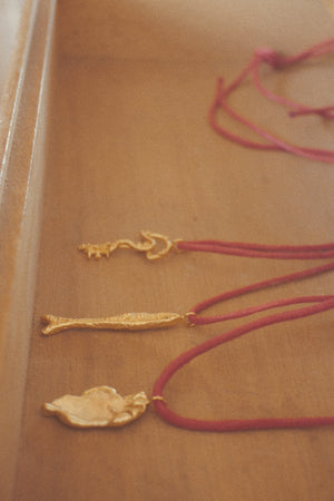 Snake Key Or Forever Sacred On Red Cord